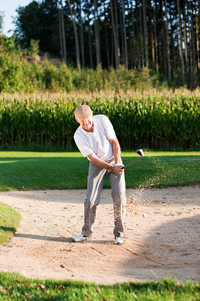 istock Senior golf player in sand trap 96901634