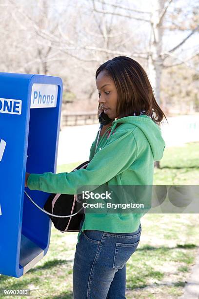 Using A Pay Phone Stock Photo - Download Image Now - Adult, African Ethnicity, African-American Ethnicity