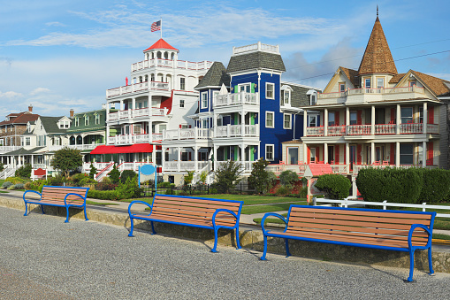 Victorian architecture along the promenade in the historic district of Cape May. Located at the southern tip of Cape May Peninsula, It is one of the country's oldest vacation destinations. The entire city (population 3,600) is designated as the Cape May Historic District because of its concentration of Victorian buildings.