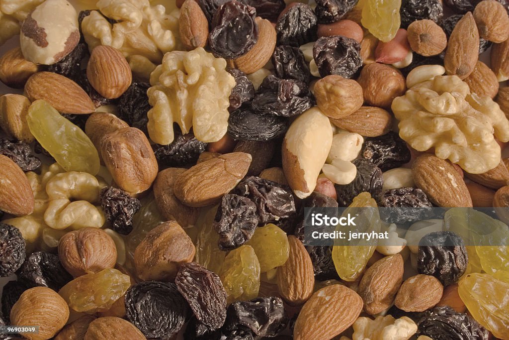 Mixed Nuts and Raisins background  Almond Stock Photo
