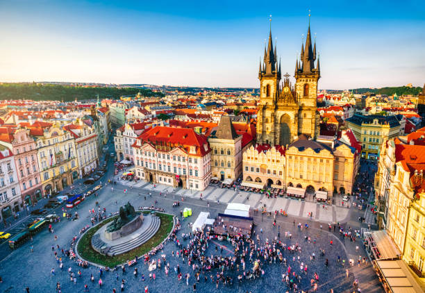 aerial view of old town square in prague - sunlight sun architectural feature blue imagens e fotografias de stock