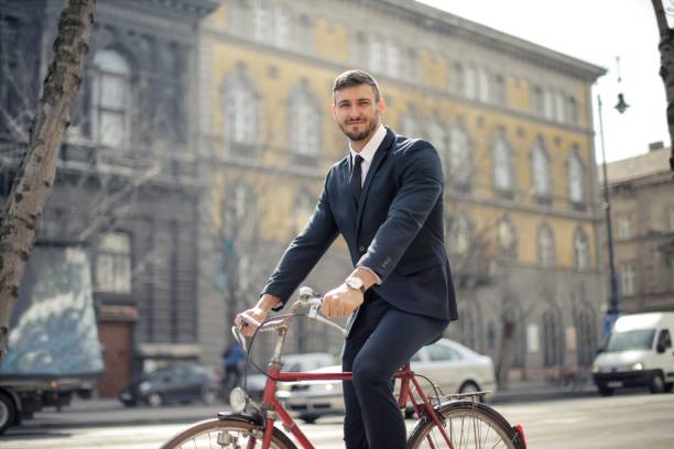 istock Businessman on his bike 969043504