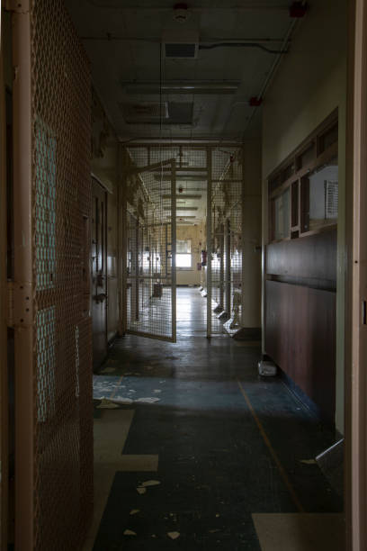 Hallway with solitary confinement cells in old prison