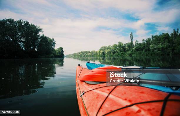 Kayaking On The Lake Concept Photo Sport Kayak On The Rocky Lake Shore Close Up Photo Stock Photo - Download Image Now