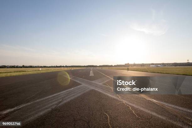 Road In Perspective In The Plain With Horizontal Signs To X Stock Photo - Download Image Now