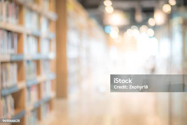 Abstract Blurred Public Library Interior Space Blurry Room With Bookshelves By Defocused Effect Use For Background Or Backdrop In Business Or Education Concepts Stock Photo - Download Image Now