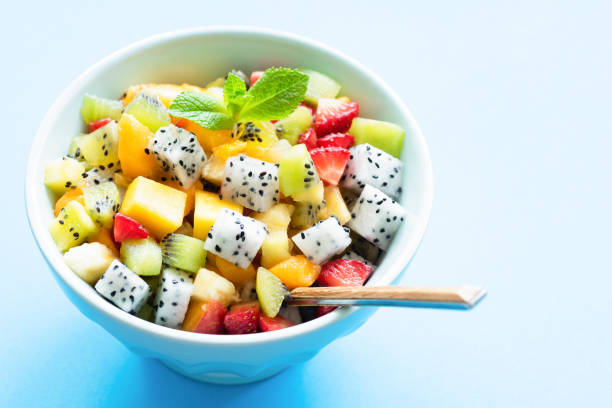 istock Exotic fruit salad with pitaya and mango in bowl 969067132