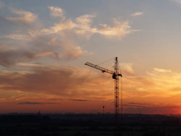 istock Construction crane against the sky at sunset 969081578
