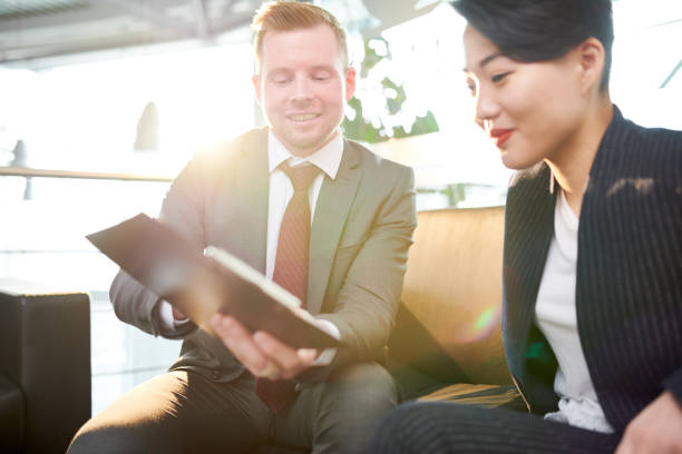 istock Project Discussion with Male Colleague 969081852