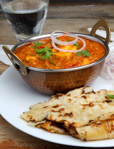 istock Indian Food or Indian Curry in a copper brass serving bowl. 969082256