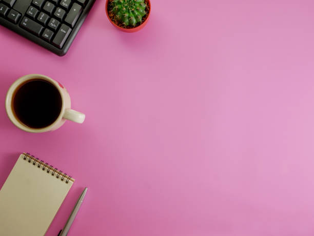 istock Flat lay pink office desk with copy space 969085458