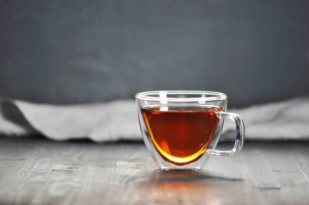 istock morning black tea in a transparent mug 969093786