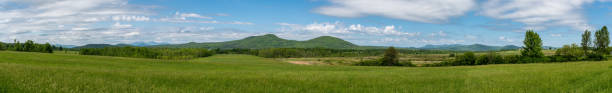 istock Panoramic view of a land in summer 969097218