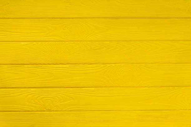 istock Brushed wood texture with yellow color background 969102886
