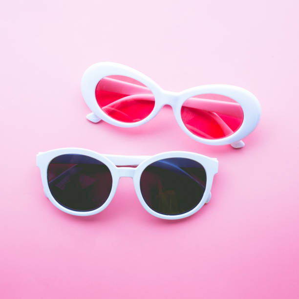 istock Glasses on color pastel background 969103024