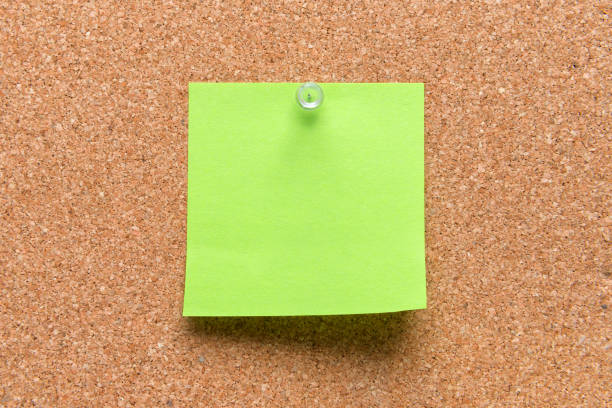 istock empty square green pinned sheet on a brown cork reminder 969103364