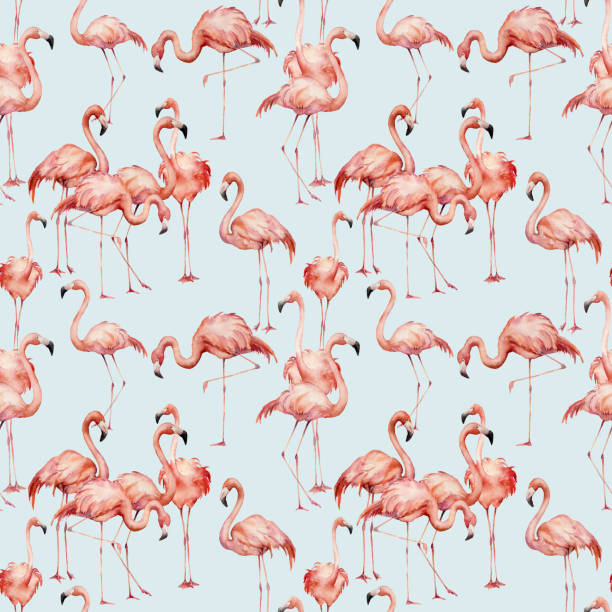 istock Watercolor pink flamingo seamless pattern. Hand painted bright exotic birds isolated on blue background. Wild life illustration for design, print, fabric or background. 969103384