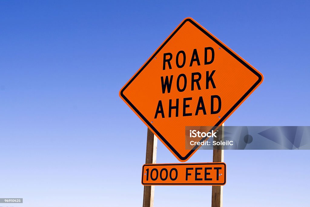 Road work ahead sign  Road Construction Stock Photo