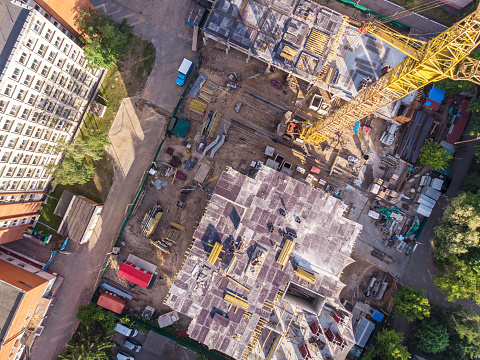 flying drone over civil construction site in progress. aerial view