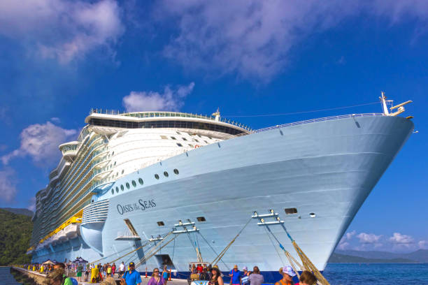 Royal Caribbean, Oasis of the Seas docked in Labadee, Haiti on May 1 2018 LABADEE, HAITI - MAY 01, 2018: People going near Royal Caribbean, Oasis of the Seas docked in Labadee, Haiti on May 1 2018. The second largest passenger ship ever constructed behind sister ship Allure of the Seas. citadel haiti photos stock pictures, royalty-free photos & images
