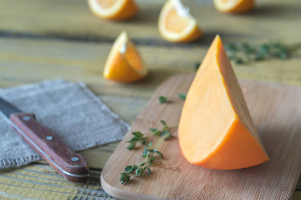 istock Mimolette cheese on the wooden board 969115258