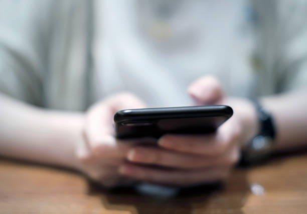 istock Young woman are using mobile phone 969115308