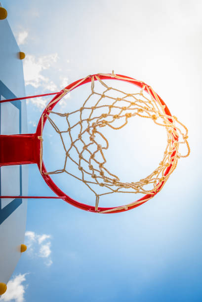 istock Basketball hoop with blue sky. 969118512