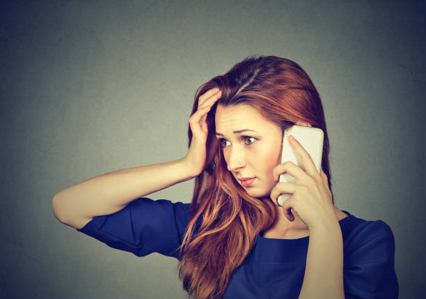 istock Stressed girl speaking on phone 969118558