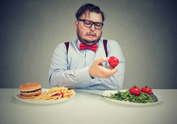 istock Man with overweight unhappy with new diet 969121646