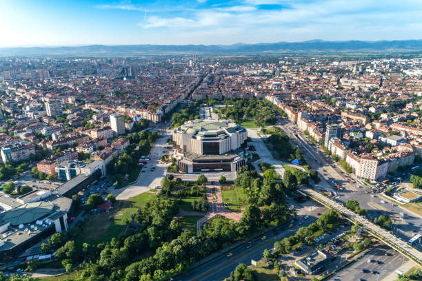 Wide aerial drone shot of national palace of culture in Sofia city downtown district Wide aerial drone shot of national palace of culture in Sofia city downtown district. The picture was taken near sunset with DJI Phantom 4 Pro drone / quadcopter. bulgaria stock pictures, royalty-free photos & images