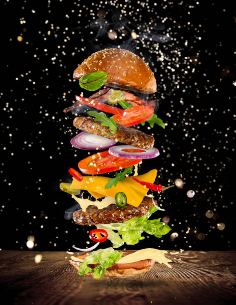 istock Big tasty burger with flying ingredients 969126158