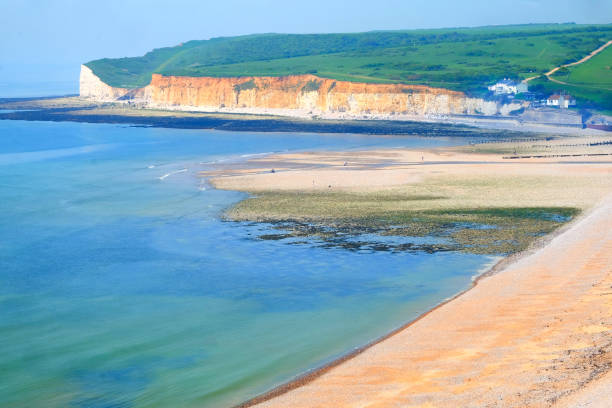 istock Cuckmere Haven bay with long sweeping beach blue sea bay and cliffs 969126218