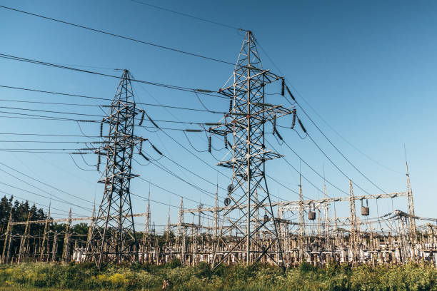 istock High voltage power lines and Electricity Power transformer station 969130164