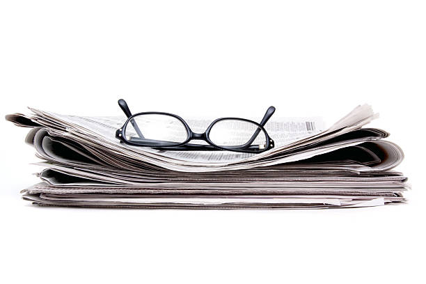 istock Newspaper and glasses 96913225