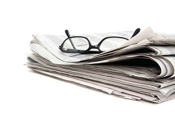 istock Newspaper and glasses 96913394