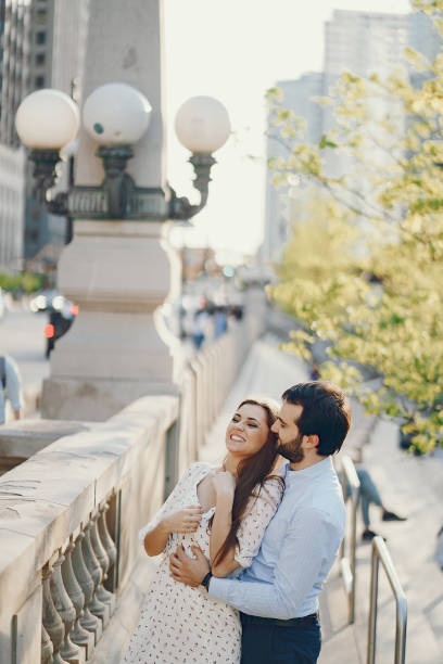 istock elegant couple in a city 969142750
