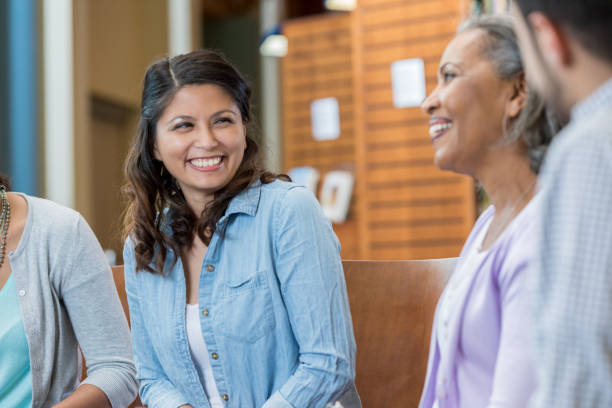 istock Woman participates in group therapy session 969143852