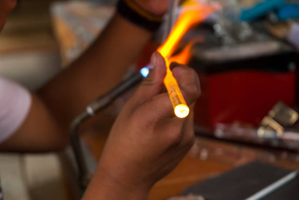 istock Chemical glassware with fire background 969148916