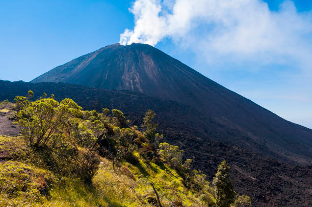 Eruption in volcano Pacaya in Guatemala, Central America. 2552 meters. Cordillera Sierra Madre, Central America. Eruption in volcano Pacaya in Guatemala, Central America. 2552 meters. guatemala landscape stock pictures, royalty-free photos & images