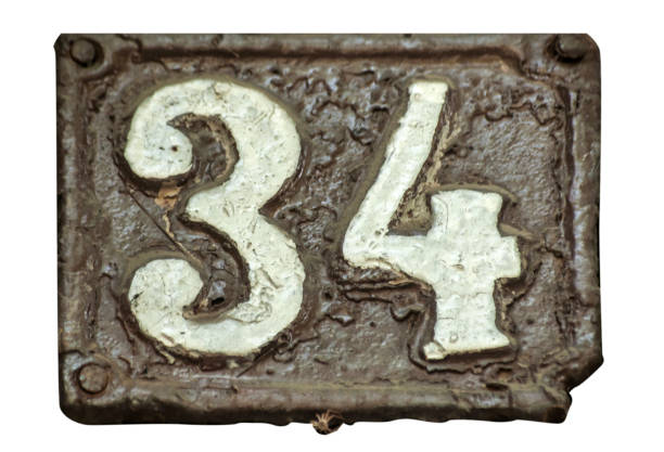 istock Old retro cast iron plate number 34 969155910
