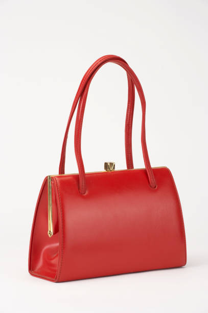 istock RED LEATHER HANDBAG ISOLATED ON WHITE BACKGROUND 969156040