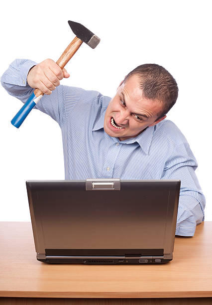 istock Angry businessman at laptop 96916258