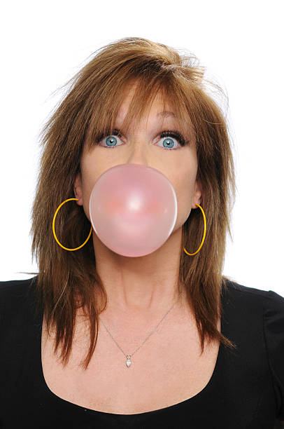 istock Woman blowing bubble gum 96917755