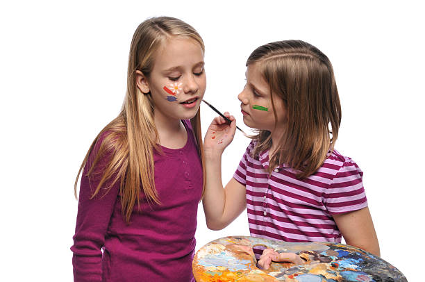 istock Young Girls doing face paint 96918369