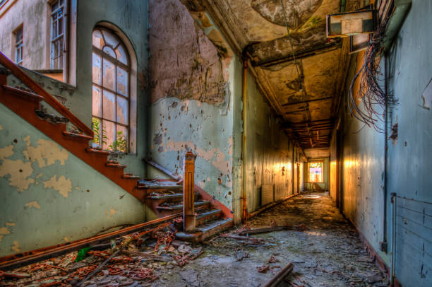 istock Sunlight comes through a window in a deserted building at sunset 969188578