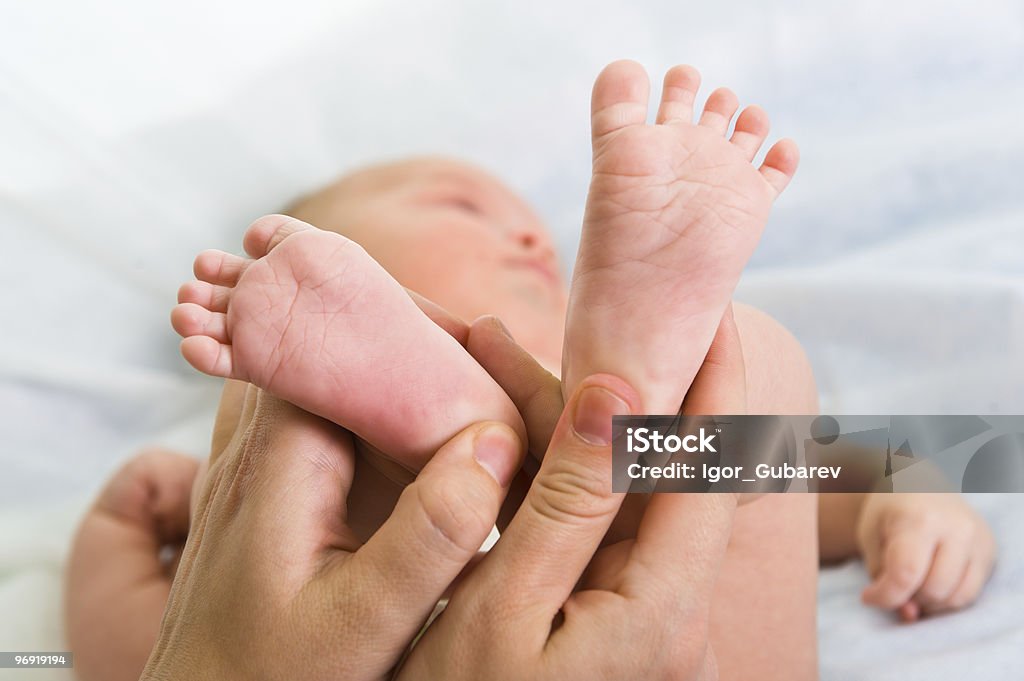 Massage of foots  0-11 Months Stock Photo