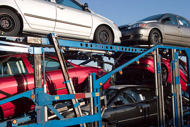 istock Five cars being transported on a truck 96920977