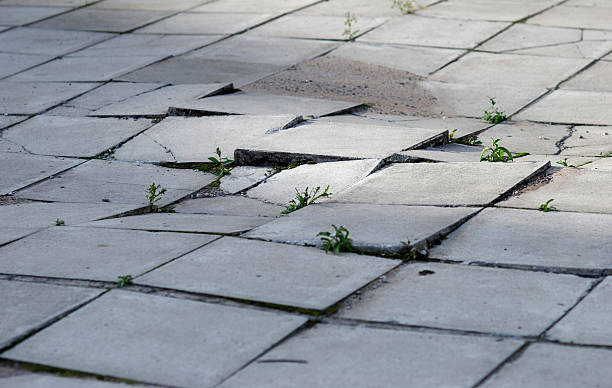 Earthquake effects on sidewalk  crevice photos stock pictures, royalty-free photos & images
