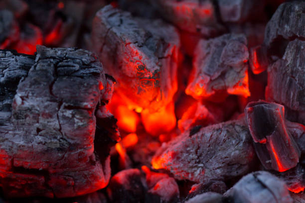 istock ,barbecue charcoal, burning charcoal in the background 969228302