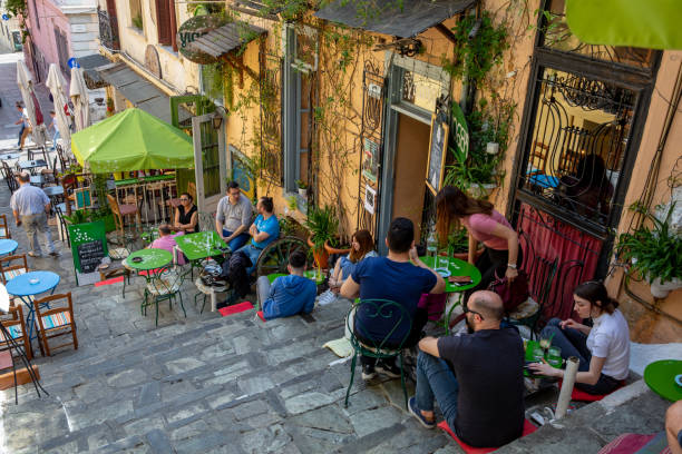 Plaka, Athens Greece Athens, Greece - april 28, 2018: Plaka district colorful people sitting at restaurants and stairs , Athens Greece
Late afternoon picture of colorful people sitting at resaturants taking place at popular Plaka, Athens Greece plaka athens stock pictures, royalty-free photos & images